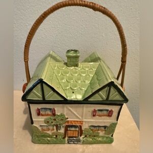 Ceramic Cottage cookie jar with wicker handle. Vintage made in Japan